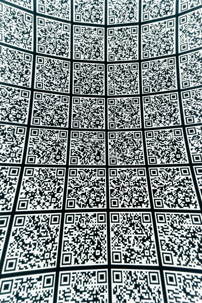 a bunch of QR-codes on a wall