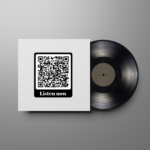 A white LP cover with a QR code on it. Just below the QR code, the text "listen now" is written. A black LP record is partially out of the cover.