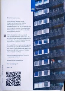 A letter from an official government agency with a house on the right, and a large QR code at the bottom